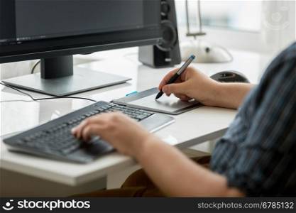 Closeup photo of professional graphic designer at work in office