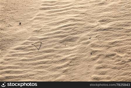 Closeup photo of sand dunes in desert