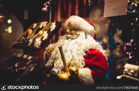 Closeup photo of Santa Claus statue with big white beard