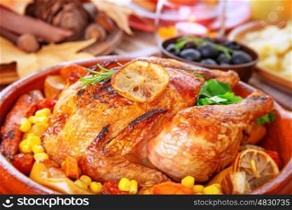 Closeup photo of tasty baked turkey in centerpiece of festive table, traditional food for Thanksgiving day holiday