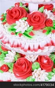 Closeup photo of the red wedding cake