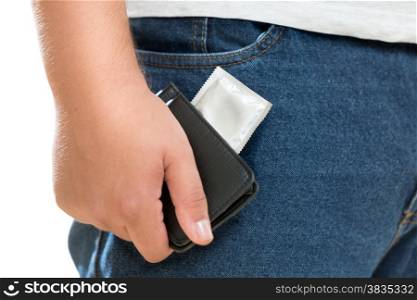 Closeup photo of young man holding condom in wallet