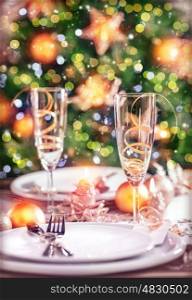 Closeup photo on festive dinner still life, festive table setting on luxury decorated Christmas tree background, New Year eve concept