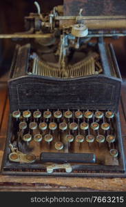 Closeup picture of a vintage, metal typewriter