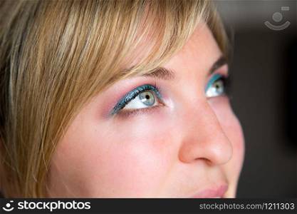 Closeup picture of beautiful rouged eyes, make-up