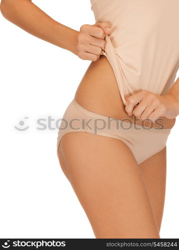 closeup picture of woman in beige cotton undrewear