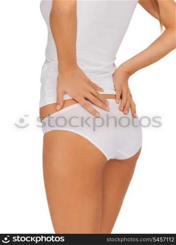 closeup picture of woman in cotton underwear showing slimming concept