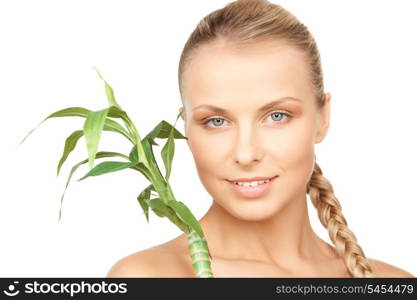 closeup picture of woman with green sprout