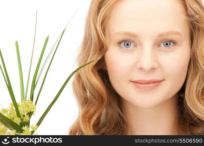 closeup picture of woman with green sprout&#xA;