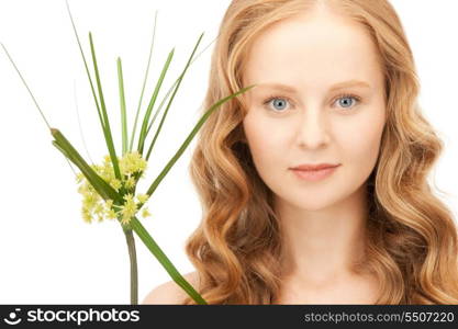 closeup picture of woman with green sprout&#xA;