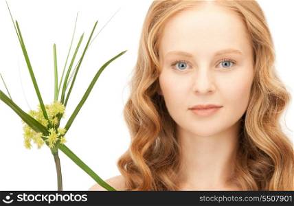 closeup picture of woman with green sprout&#xA;