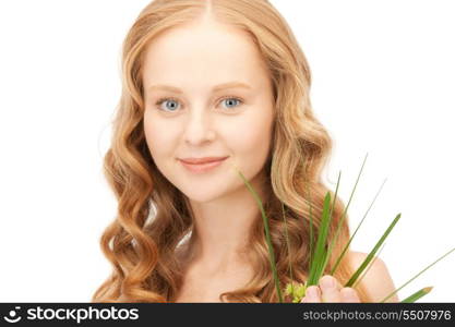 closeup picture of woman with green sprout&#xA;