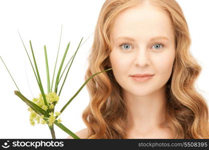 closeup picture of woman with green sprout&#xA;