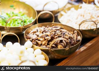 Closeup pile of freshly chopped shiitake mushroom, thai street food market