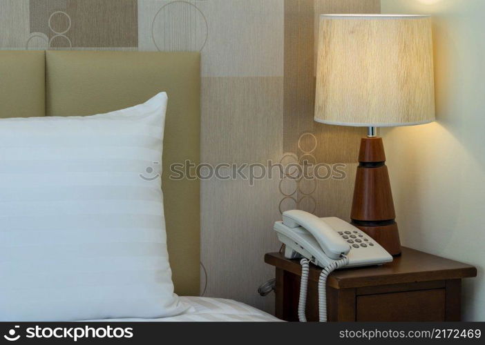 Closeup pillow on the bed with l&in luxury hotel, decorate and safety concept