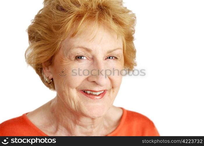 Closeup portrait of a beautiful red haired senior lady. White Background