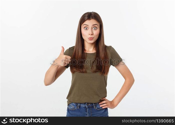 Closeup portrait of a beautiful young woman showing thumbs up sign. Isolate over white background. Closeup portrait of a beautiful young woman showing thumbs up sign. Isolate over white background.