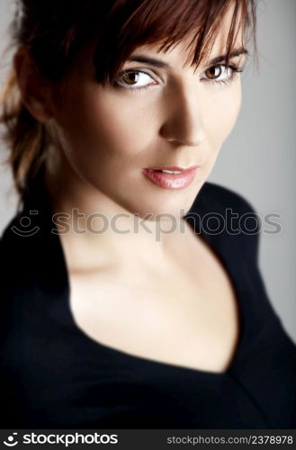 Closeup portrait of a beautiful young woman with a gorgeous face and great eyes
