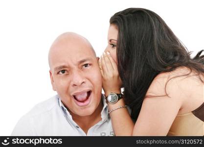 Closeup portrait of a cute young woman whispering in her husband ear