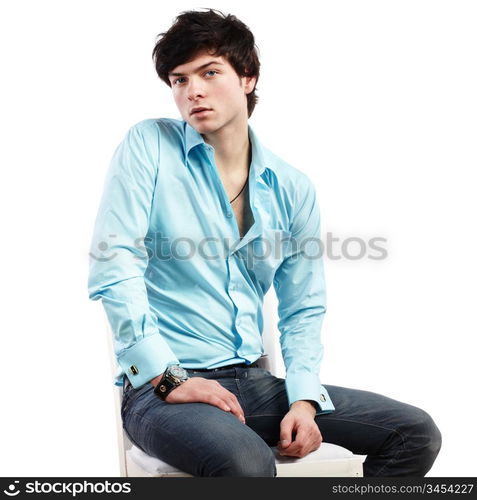 Closeup portrait of a handsome young sexual man smiling against white background