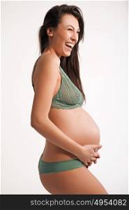 closeup portrait of a happy pregnant woman