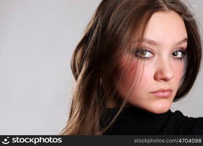 Closeup portrait of a happy young woman