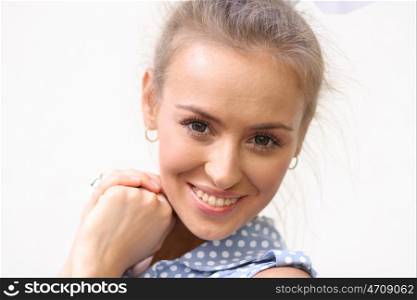 Closeup portrait of a happy young woman