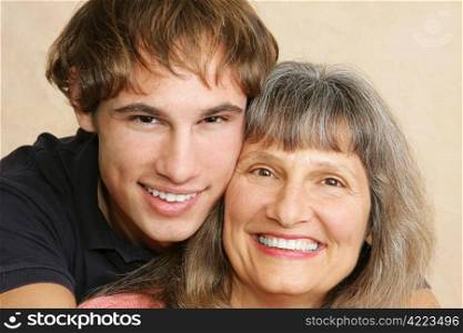 Closeup portrait of a mother and her young adult/late teen son.