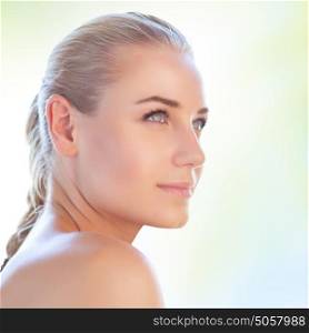 Closeup portrait of a nice blond woman over clear background, conceptual photo of natural beauty, skin care, pampering, day spa