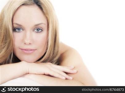 Closeup portrait of a pretty young woman on isolated background
