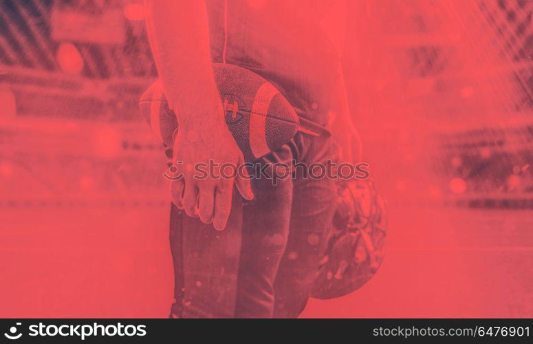 Closeup Portrait of a strong muscular American Football Player on big modern stadium field with lights and flares. closeup American Football Player isolated on big modern stadium