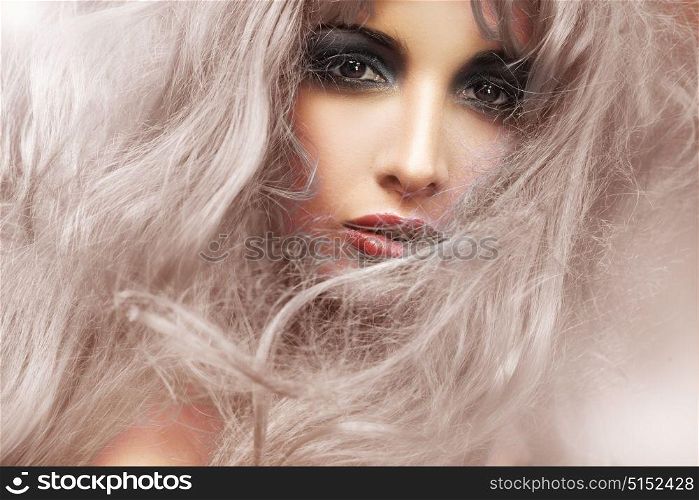 Closeup portrait of a woman with fluffy haircut