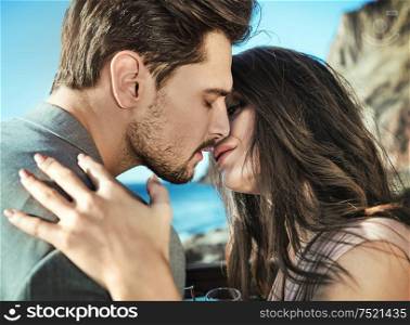 Closeup portrait of a young, kissing couple