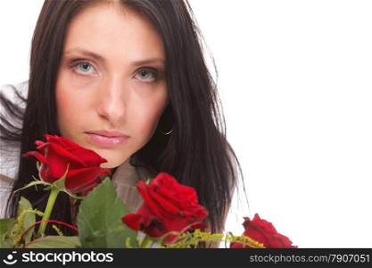 Closeup portrait of an attractive young woman holding a red rose
