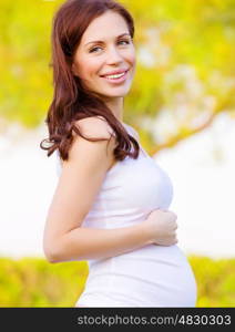 Closeup portrait of attractive smiling pregnant woman outdoor, happy motherhood, healthy pregnancy, new life concept &#xA;
