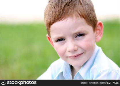 Closeup portrait of beautiful little boy