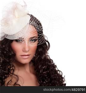 Closeup portrait of beautiful stylish bride isolated on white background, wearing hat with veil, sexy woman, fashion and style concept