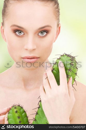 closeup portrait of beautiful woman with cactus