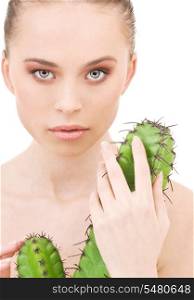 closeup portrait of beautiful woman with cactus