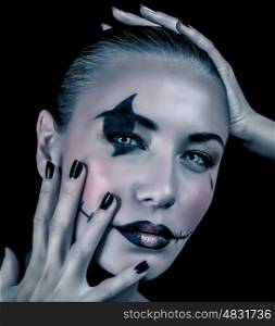 Closeup portrait of beautiful woman with creepy makeup for Halloween party, isolated on black background, fashionable holiday celebration concept
