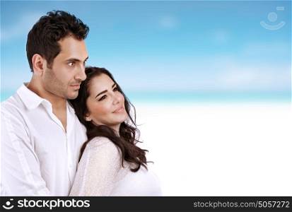 Closeup portrait of beautiful woman with handsome man spending time on the beach, honeymoon vacation, summer holidays concept