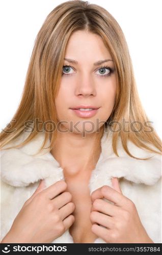 Closeup portrait of charming girl in a white fur coat