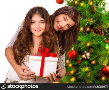 Closeup portrait of cheerful young family celebrating New Year holidays, receive present, happy Christmastime party, Merry Christmas concept