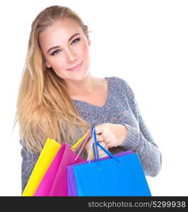 Closeup portrait of cute blond girl with colorful shopping bags isolated on white background, many gifts for Christmas holidays, sale season concept