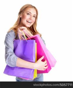 Closeup portrait of excited female with shopping bags isolated on white background, doing purchase with pleasure, money spending and seasons sales concept