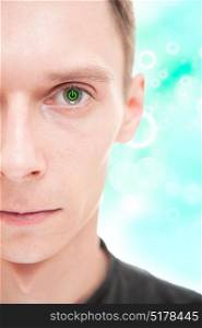 Closeup portrait of half face of young man with power button inside his eye. Interactive world concept