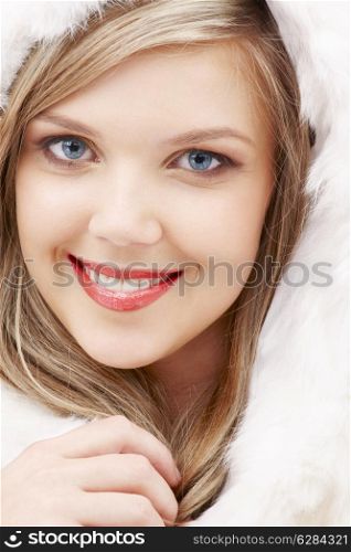 closeup portrait of lovely blond in fur