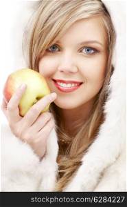 closeup portrait of lovely blond in fur with apple