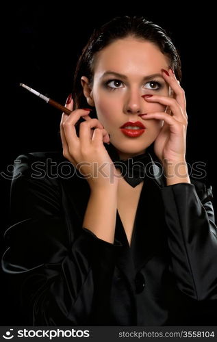 Closeup portrait of nice brunette with a mouthpiece in hand