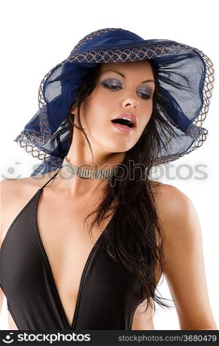 closeup portrait of pretty brunette young woman wearing a nice summer hat